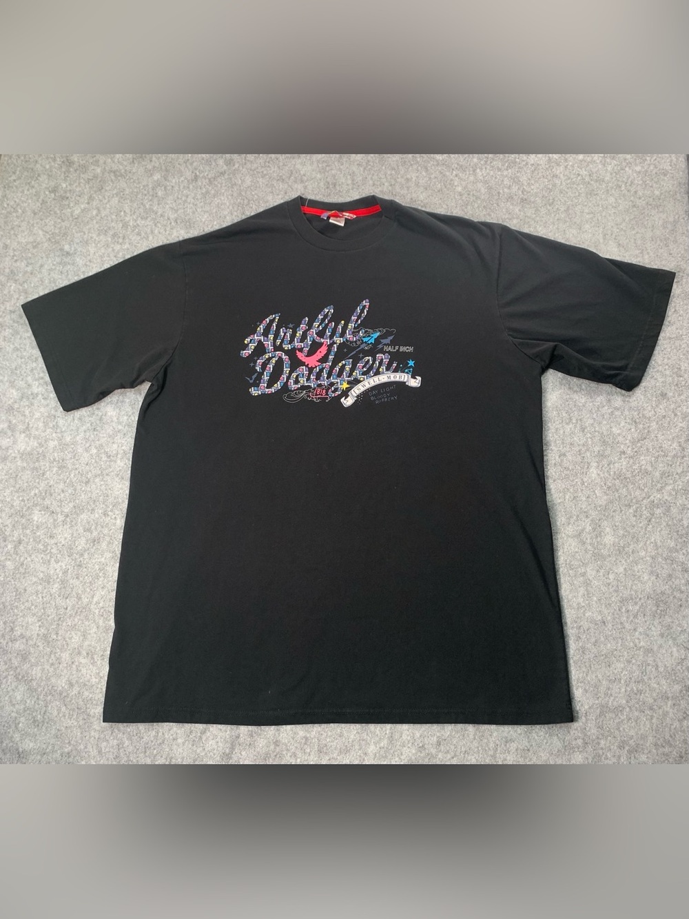 Artful Dodger" Black Graphic Crewneck Tee with Multicolor Script